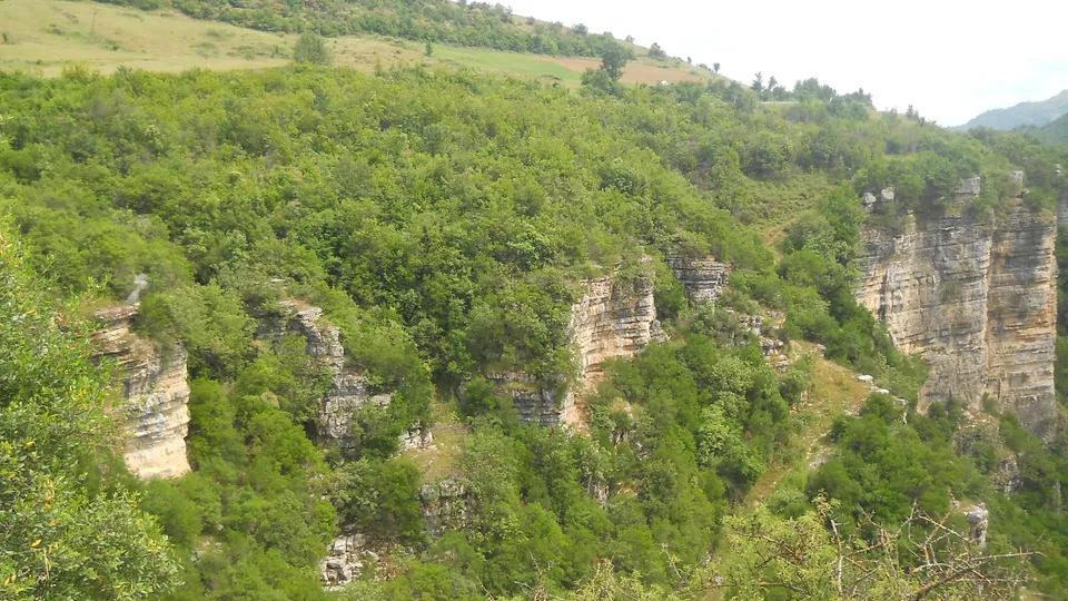 The Osumi Canyon narrowing to a slot between two tall rock walls